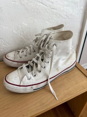 Worn white converse high tops 9